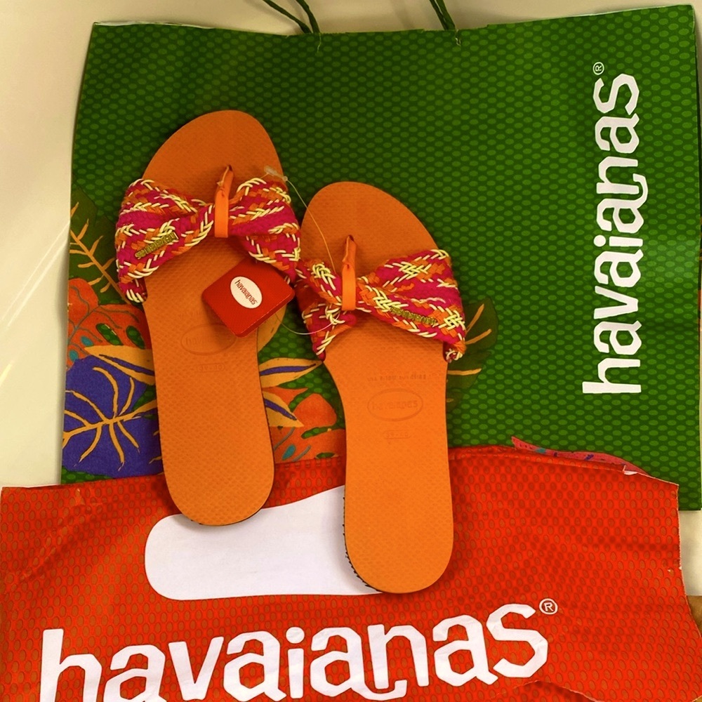 Havaianas sandals / slides Never worn. Brand new. Coral/orange and pink